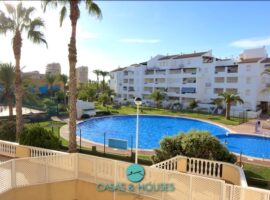 Exclusive – Stylish 2-Bedroom Apartment with Pool, Garage & Garden Views